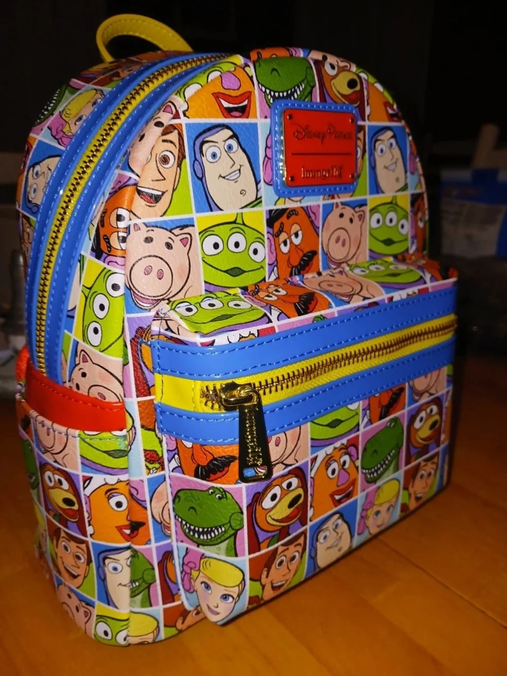 Disney Pixar Multicolor Kids Mini Backpack - Toy Story Character Patchwork